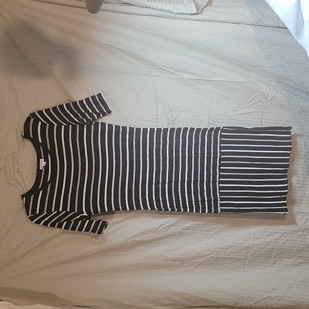 Brand New. LulaRoe Julia t-shirt dress, totally comfy stretchy midi length.